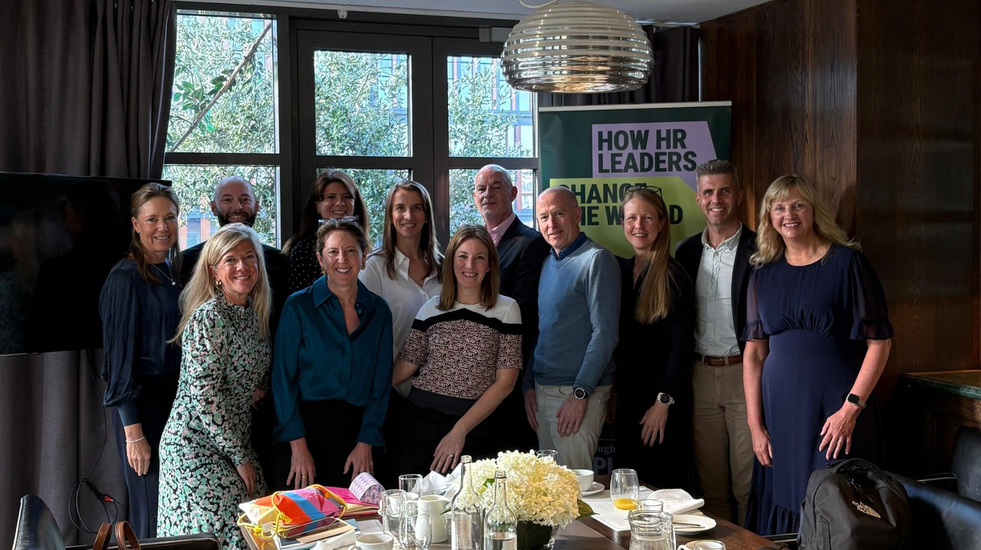 Group of senior HR leaders and Tom Emery at the uplifting people HR breakfast.